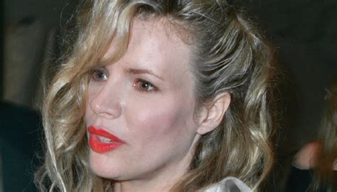 Kim Basinger Stuns in Throwback Tiger Swimsuit Photo,。